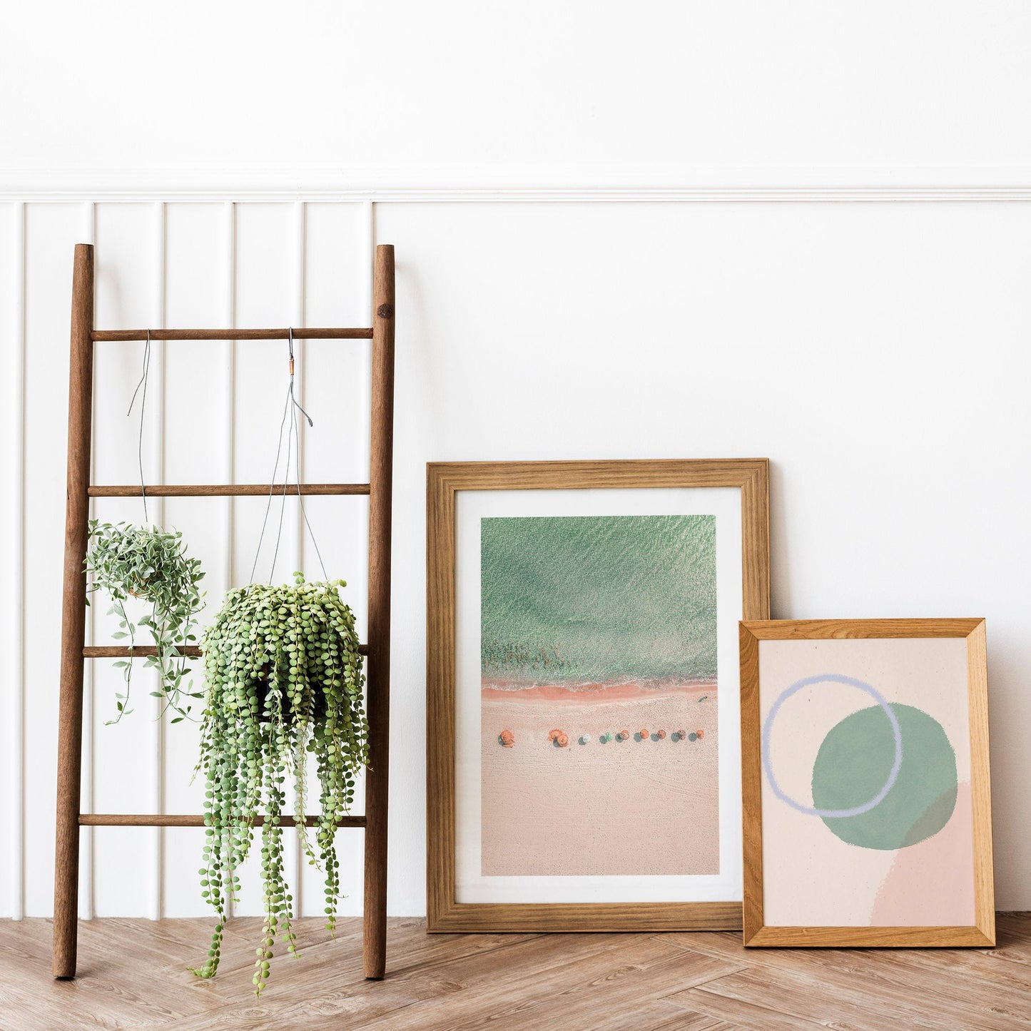 Orange and green interior decor with coastal art prints