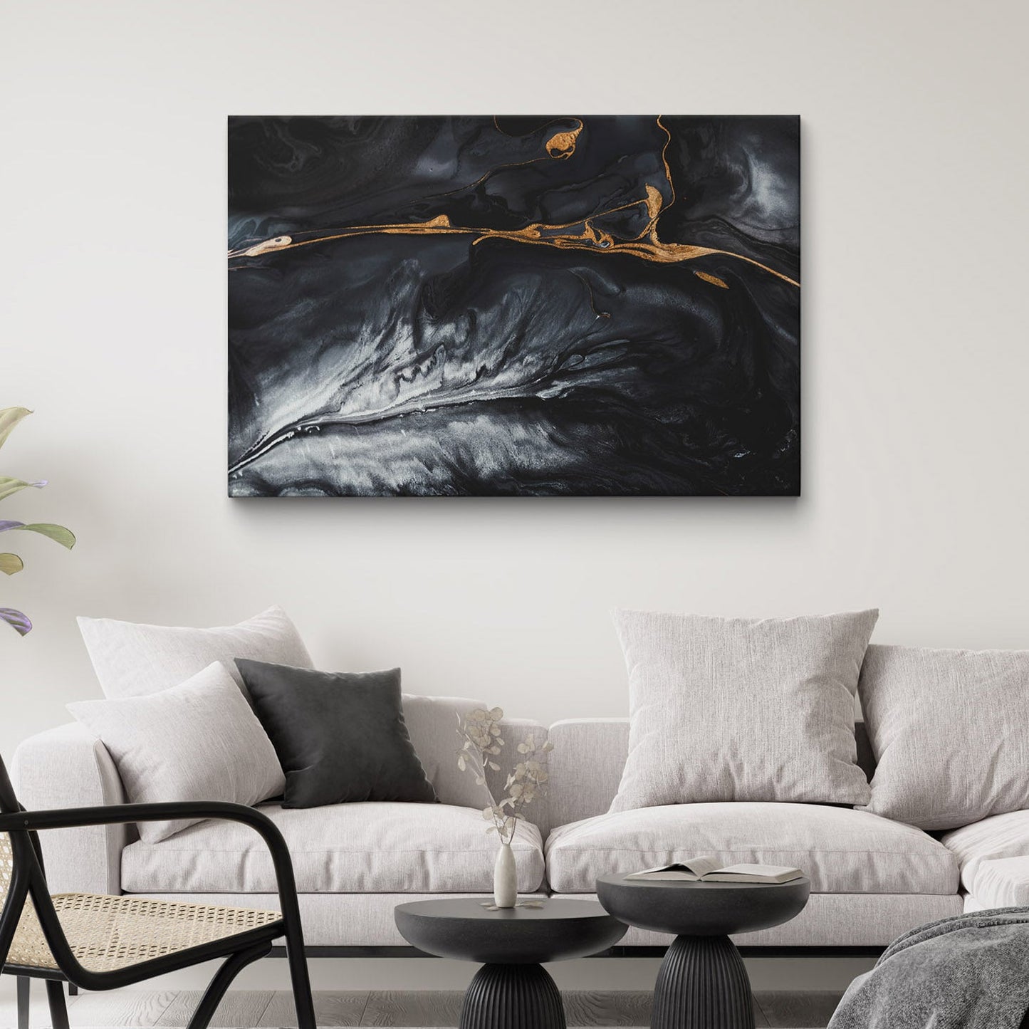 Luxury gold fluid art on canvas hung in a living room