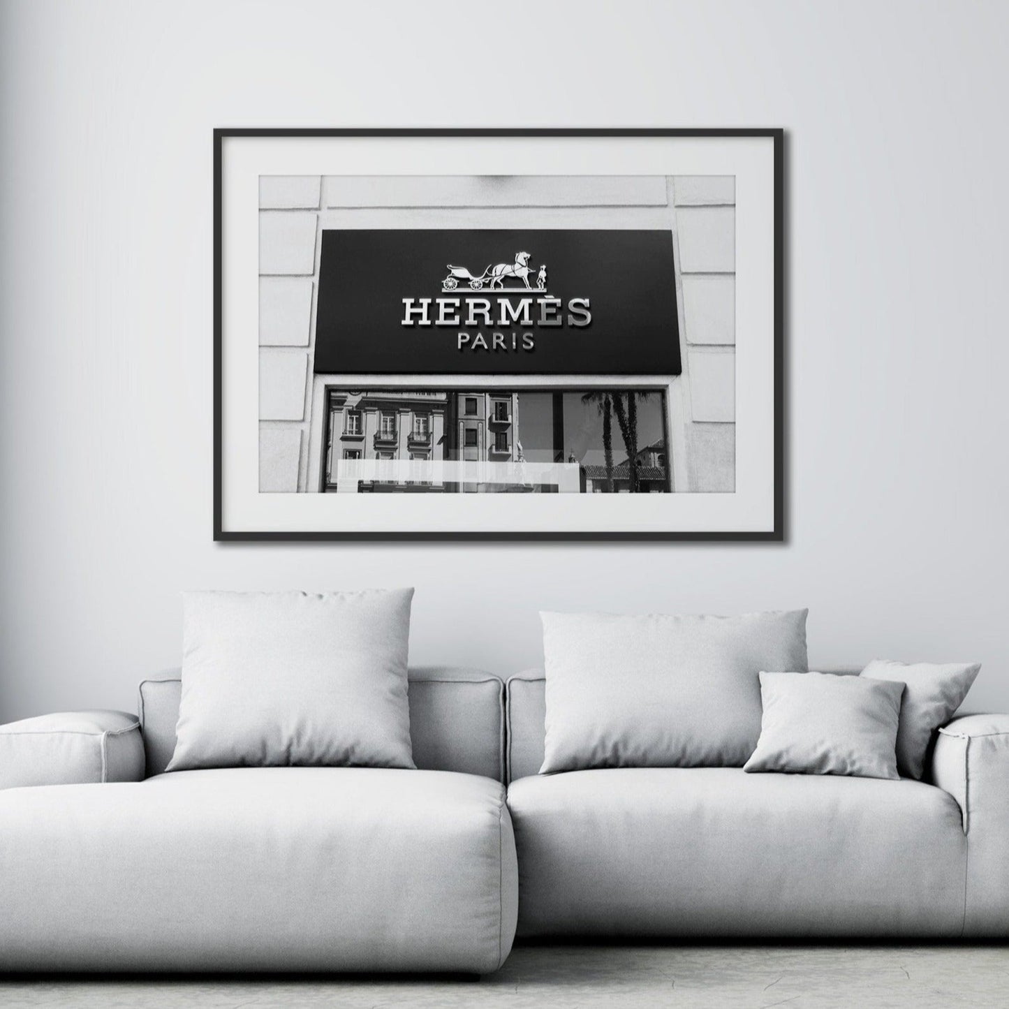 Hermes wall art hanging in living room