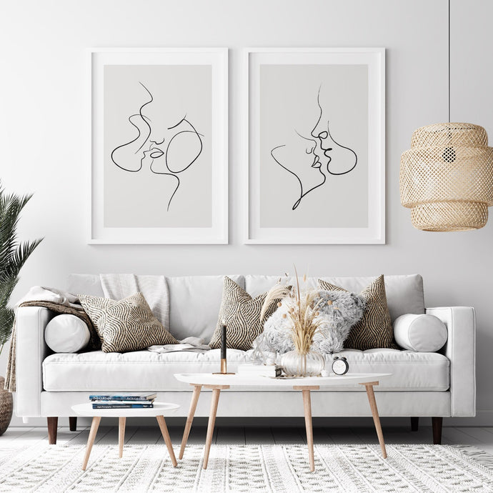 Set of 2 line art posters framed on wall