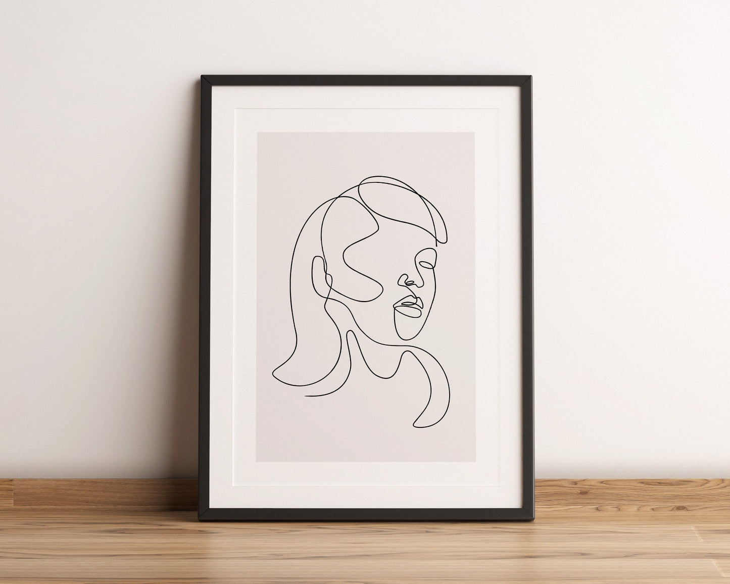 Line art featuring a woman's face