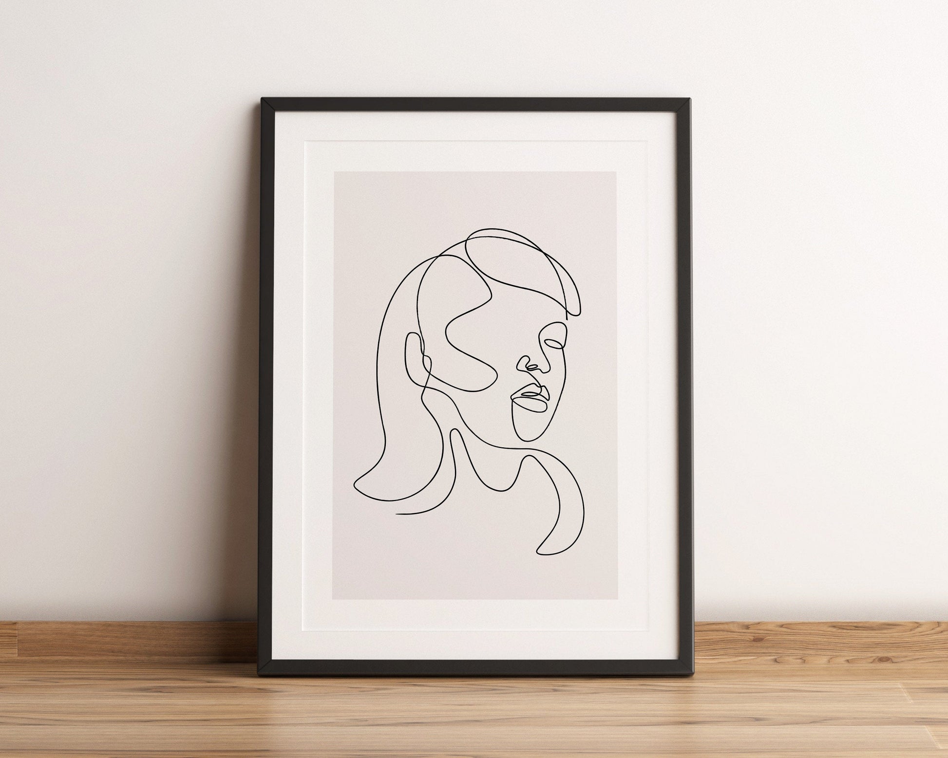 Line art featuring a woman's face