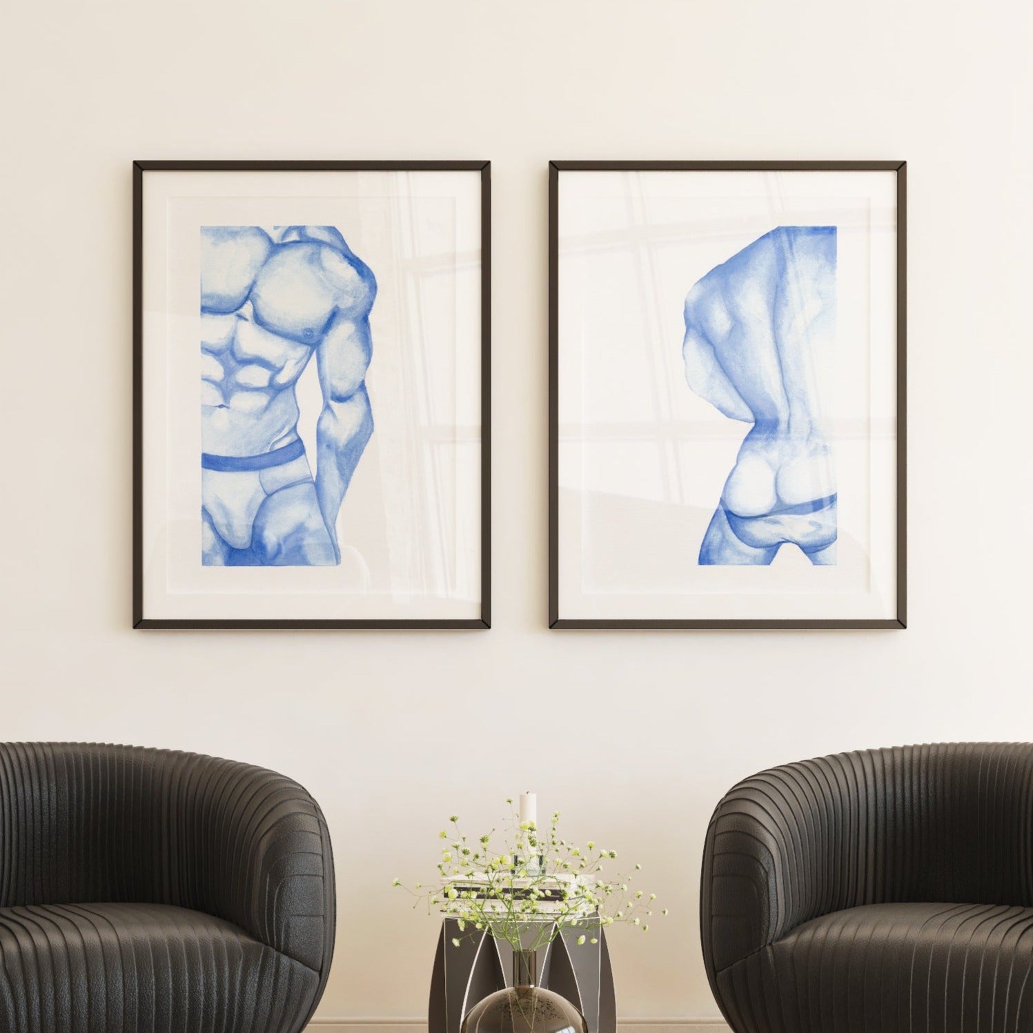 A set of 2 framed prints featuring nude men