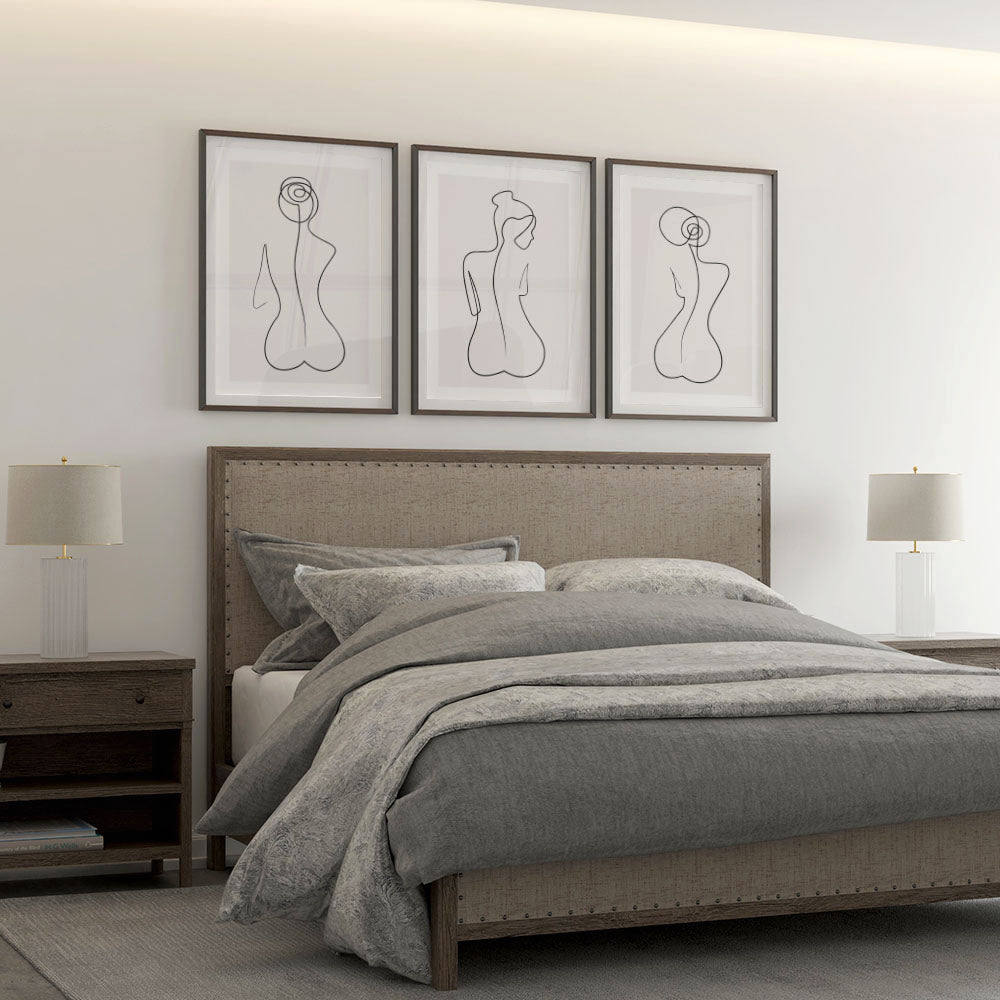 Bedroom decor with a set of 3 line art prints above a bed