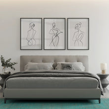 Load image into Gallery viewer, A set of 3 abstract line art prints hanging above a bed
