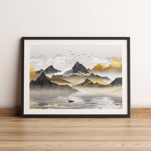 Load image into Gallery viewer, Framed print featuring grey and gold mountains and lake

