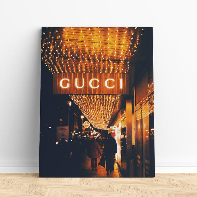 Gucci canvas print in gold