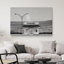 Load image into Gallery viewer, A modern living room interior with a Chanel photography canvas print

