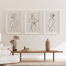 Load image into Gallery viewer, A set of 3 minimalist line art prints hanging in a study
