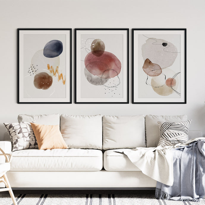 Scandinavian style living room with 3 abstract art prints