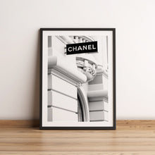 Load image into Gallery viewer, Black &amp; white photography poster of a Chanel store

