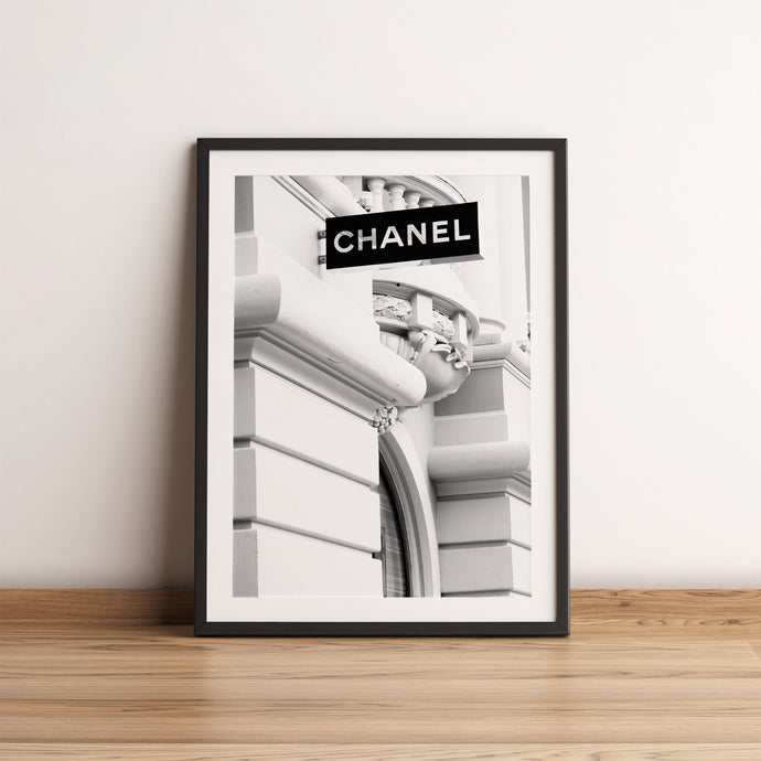 Black & white photography poster of a Chanel store