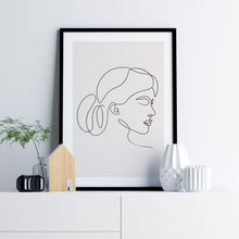 Load image into Gallery viewer, Line art poster featuring woman with hair in a bun
